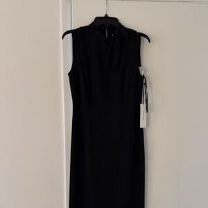 Calvin Klein Elegant Black Sleeveless Dress with Bow on Neckline